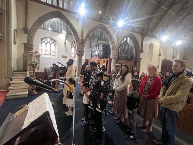 Parishioners receiving Communion near the sanctuary