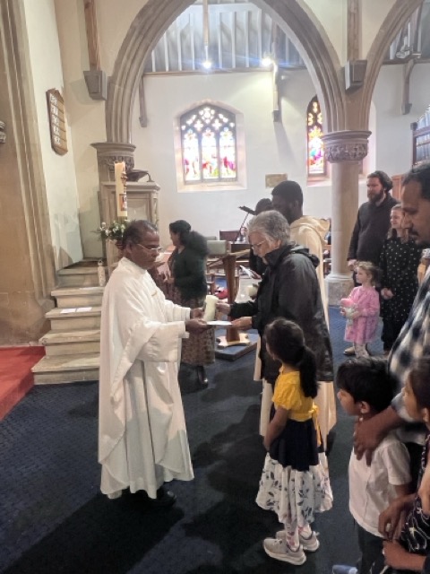 Parishioners and families in the Communion procession